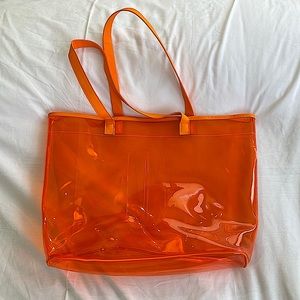Clinique see-through limited edition bag in orange